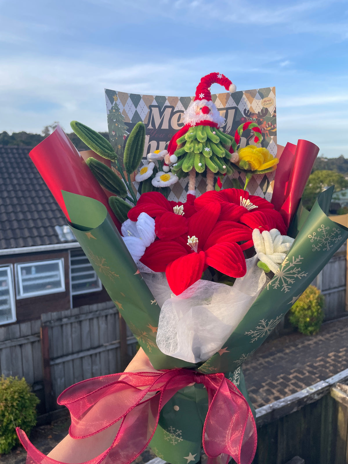 Santa red flower handcrafted Christmas bouquet