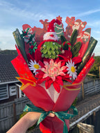 Santa red and green handcrafted Christmas flower bouquet
