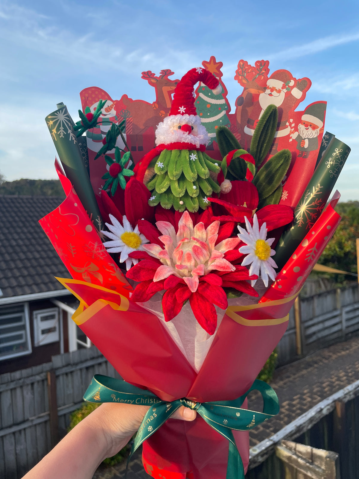 Santa red and green handcrafted Christmas flower bouquet