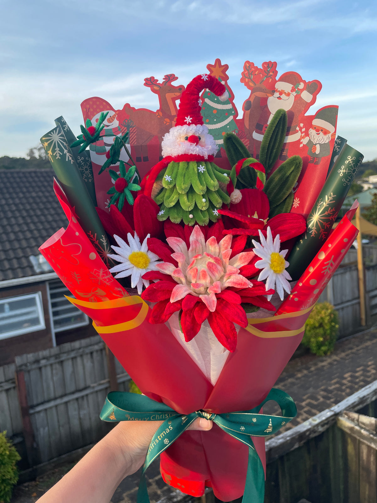 Santa red and green handcrafted Christmas flower bouquet
