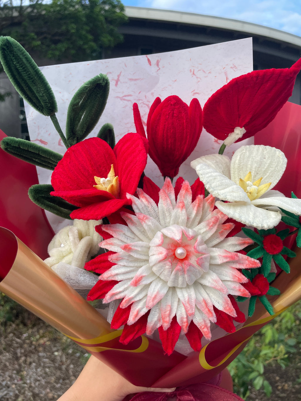 Red and white handcrafted Christmas flower bouquet