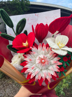 Red and white handcrafted Christmas flower bouquet